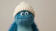 © Den Boro Day - Whimsical Blue Fuzzball in a Cozy Knit Cap, Playful Character Portrait.