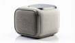 © Ai_Stock - Modern portable mini bluetooth speaker with fabric finish isolated on a white background.