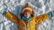 © CreativeSuburb - Child making snow angel feeling joy in winter