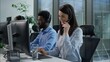 © Yuliia - Callcenter success multiethnic operators work computer helpline service agency Caucasian business woman clenching fist successful online trading Indian African coworkers headset call center in office