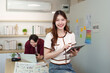 © Natee Meepian - Young Designer Using Tablet for UX UI Project