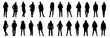 © Dhiraj - Bundle of modern people wearing Street fashion autumn, winter warm clothes. Men and women in trendy outwear standing and walking. Cartoon characters vector illustration.