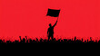 © Md Shamimul - A silhouette of an individual holding up a black flag with their hand