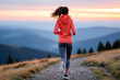 © Klemenso - Runner enjoys a sunset jog on a mountain trail during twilight hours Generative AI