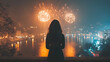© syhin_stas - Back view of lonely woman standing on balcony, watching fireworks in night sky, New Year atmosphere