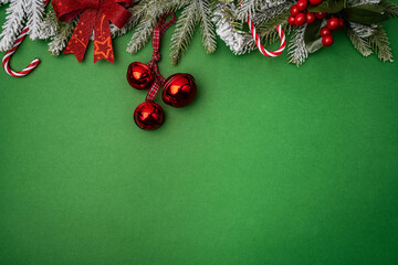 Wall Mural - christmas and happy new year background with gold glitter decorations on green bright background. ho