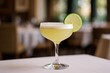 © Anna - Elegant and simple Daiquiri cocktail made with rum, lime, and sugar, served chilled with a lime wheel on the rim.