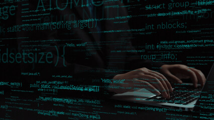 Close-up of hands typing on a laptop, with a backdrop of code lines illustrating programming concepts in a sleek, modern digital workspace. Xenic