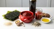 © Reza Febrian - Assortment of Korean Ingredients Seaweed, Gochujang, Mushrooms, and Anchovies
