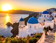 © Lasno - Sunset over Santorini churches