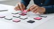 © Anita Digital Studio - Strategizing business process with colorful blocks on flow chart