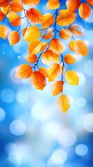 Wall Mural - Autumn leaves in vibrant colors against a soft, blurred blue background.