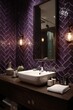 © Alaska young - A stylish bathroom vanity with a dramatic purple herringbone tiled wall, showcasing a sleek white sink and dark wood countertop.