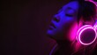 © Popelniushka - Asian Girl Enjoying Favorite Music Online with Modern Headphones and Eyes Closed in a Neon Atmosphere