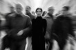 © DIMENSIONS - Alone in the Crowd - A Woman Standing Still Amidst a Blurry Fast-Moving Crowd Capturing Solitude and Isolation in the Modern Urban Lifestyle Image