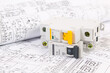 © bayurov - Electrical engineering drawings and modular circuit breaker.