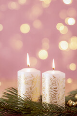 Wall Mural - A beautiful, bright, festive Christmas abstract pink background with lit candles and a bokeh effect. Shining and sparkling, vibrant. Vertical banner, copy space