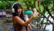 © David - Thai Girl Takes Selfies at Gardens and Waterfalls in Thailand