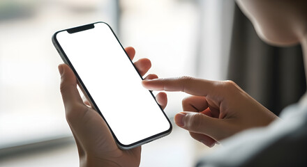 Closeup of a person holding and using a modern smartphone with a blank white screen, perfect for showcasing your app or mobile website