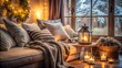© Nasima Begum - Cozy winter living room with a comfortable sofa, warm blankets, glowing candles, and a festive wreath, creating a hygge atmosphere by the window with a snowy view