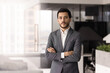 © fizkes - Serious young Middle Eastern business executive man posing in office