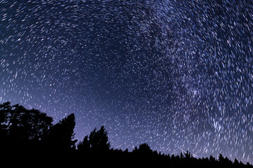 Wall Mural - Star Trails of Milky Way Galaxy in North Sky Over Palomar Mountain San Diego Astrophotography in California USA
