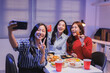 © crizzystudio - Friends taking selfie together having fun party