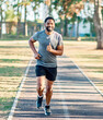 © Lumos sp - Man jogging and running in a park healthy lifestyle