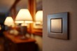 © Yermek - Photorealistic square switch plate with brushed surface in warm cozy interior.