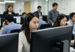 © sujon1638 - Focused customer service representatives engage with clients through headsets in a busy modern office environment