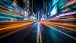 © Taslima - Blurring city lights create a streaking tunnel of color on a busy street at night