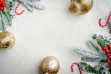 Wall Mural - christmas and new year background with fir branches with gold holiday decorations and pine cones on 