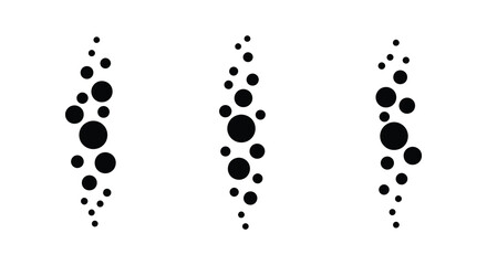 Abstract pattern of black circles arranged in vertical uneven columns