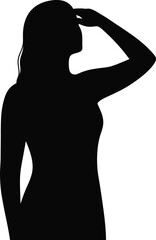 Wall Mural - Silhouette of a woman looking through her fingers toward the light