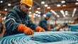 © satisfied - Industrial Worker Handling Steel Wire