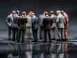 © AI-HAL8 - Business team meeting miniature figures group discussion leadership concept idea
