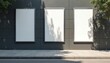 © Viktor - Three blank billboards mounted on dark tiled wall provide ample copy space for advertising, promotions. Outdoor display area with sidewalk, tree shadows, ideal for marketing, retail, public