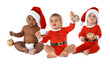 © New Africa - Cute babies in Christmas clothes on white background