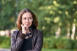 © elenavolf - Thoughtful caucasian young female outdoors in leather jacket on a sunny day.