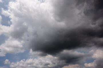 Wall Mural - dark sky with stormy clouds. dramatic sky rain,dark clouds before a thunder-storm,clouds before rain