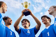 © Rido - Sport team celebrate holding trophy after the victory