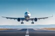 © Thanapong - Commercial airplane is captured mid landing on clear day with bright blue sky, showing aircraft front view and runway details, evoking sense of precision and calm