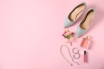 Wall Mural - Flat lay composition with boutonniere and accessories on light pink background. Space for text