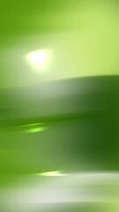 Wall Mural - lime green gradient background animation features smooth, dynamic motion. this vibrant, seamless loo