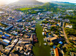 Aerial view of residential houses and driveways neighborhood during a fall sunset or sunrise time.Tightly packed homes.Top view over building houses in phuket thailand