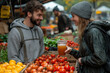 © Firuza - Man and woman with tomatoes at table.