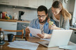 © Geber86 - Couple working together at home