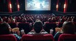 © Soem - People watching a movie in a theater.