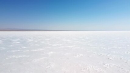 Wall Mural - Wide Shot of an Expansive Salt Flat Stretching to the Desert Horizon simplicity, empty, exploration