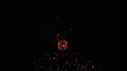 Colorful fireworks exploding in the night sky. Celebrations and events in bright colors. Vibrant fireworks display against night sky Colourful fireworks are glowing Happy new year concept.
